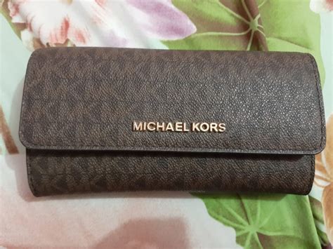 dompet kors terbaik.